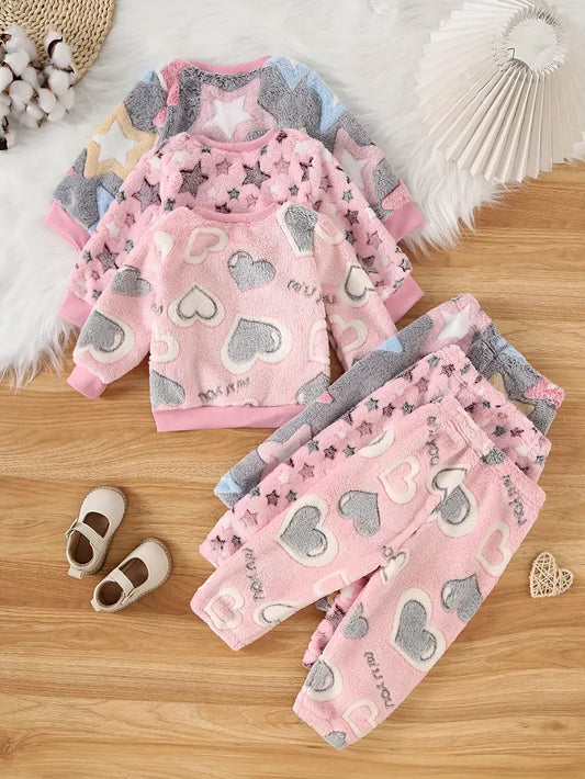 3 Sets of Girls Pyjamas, fleece material Size 12-18 Months