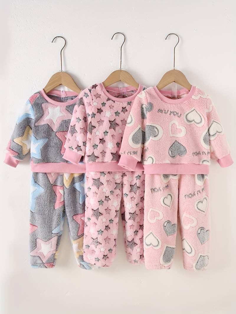 3 Sets of Girls Pyjamas, fleece material Size 12-18 Months